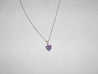 Beautiful diamond necklace with purple heart. $100 1