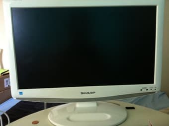 Sharp LCD TV and Monitor 19" - White for $90 1