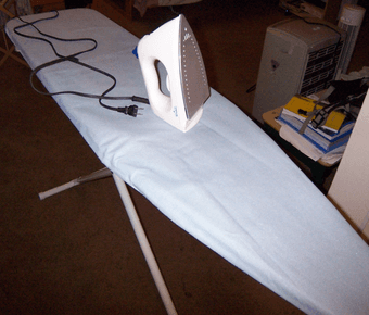 $25 steam & dry iron and large table 1