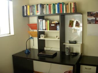 Black Ikea desk with shelves and drawers 1