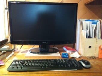 computer monitor, wireless keyboard and mouse 1