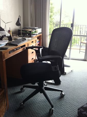 Writing desk chair - ergonomic/rolls/armrest - $90 1
