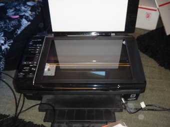 Epson Stylus NX215 Printer/Scanner + one ink cartridge - $35 2