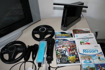 Wii console with 2 controllers and 5 games $150 1