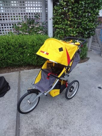 BOB ironman Stroller (with weather shield and traveling bag) = $180 1