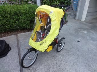 BOB ironman Stroller (with weather shield and traveling bag) = $180 2