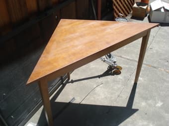 Really cool triangular wood table-200 1