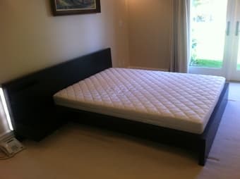 Ikea bed frame + bedside table + mattress ($300 total) 1
