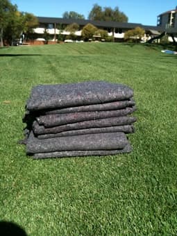 8 moving blankets - $30 1