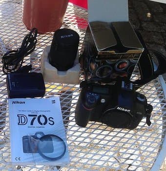 Nikon D70S + Lens 28-80: $125 1