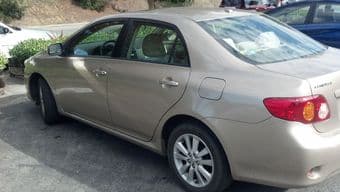2010 Beige Toyota Corolla $15000 3