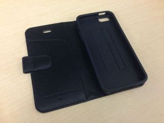Black iPhone 5 case and Belkin FM transmitter 2