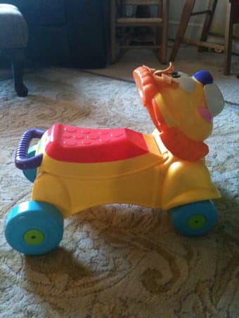car seat, walker, and toys 2