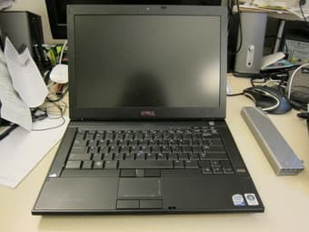 Dell Latitude E6400 laptop with a docking station - $300 1