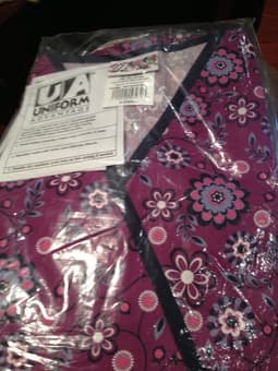 Medical school books and white coat 1