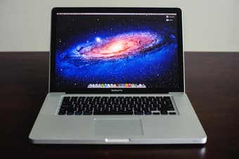 15" Macbook Pro - $900 1