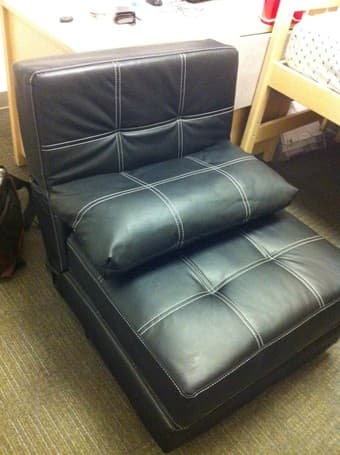 LIKE NEW black leatherette sleeper chair (folds out into bed) $40 1