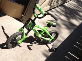 Selling 12" green bicycle for $30 1
