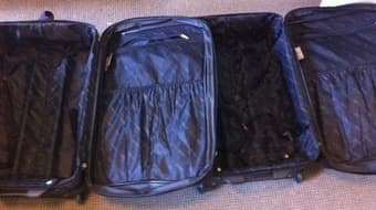 2 large suitcases $10 each ! 2