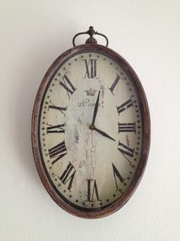 CHANTAL OVAL VERTICAL IRON CLOCK $10 1