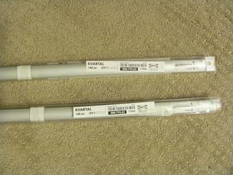 Two curtain rails (unused) $2 each 1
