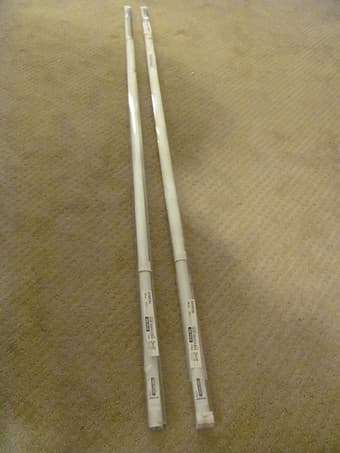 Two curtain rails (unused) $2 each 2