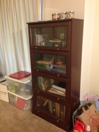 Book case with sliding shelf doors - $40 1