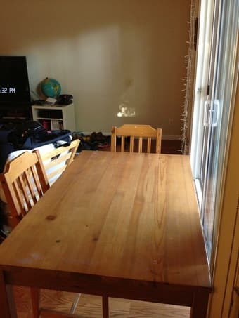 FOR SALE - Wooden table and 4 matching chairs - $100 1