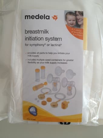 BRAND NEW Medela Pump, accessories, amd first year book 2