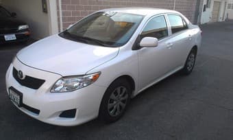2010 Toyota Corolla LE, White, $10,400 1