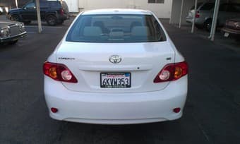 2010 Toyota Corolla LE, White, $10,400 3