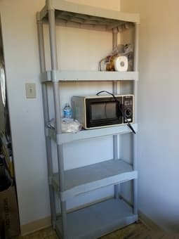 Plastic shelving unit (4 shelves) $10 1