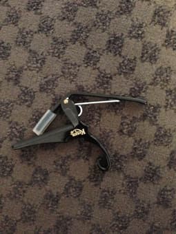 Acoustic guitar with capo for $100 2