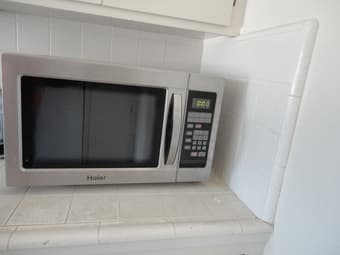 Haier Brand 700 HMC1035SESS Countertop Microwave Oven for $45 1