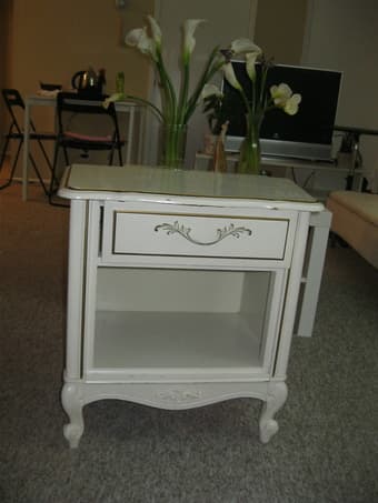 White,walnut table with gold frame,function as a night stand $30 2