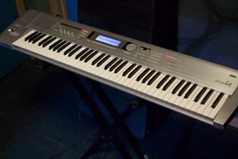Korg Triton 76-Key Workstation w/ Shipping Case & Stand 1