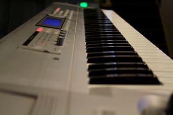 Korg Triton 76-Key Workstation w/ Shipping Case & Stand 2