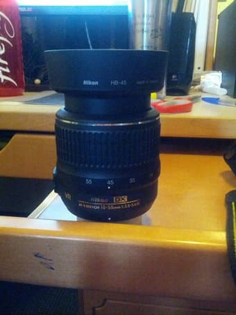 Nikon 18-55mm lens + Neewer manual flash 2