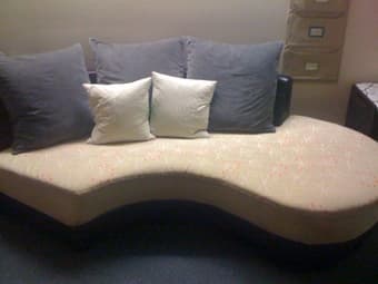 couch + ottoman + 3 big pillows - $150 2