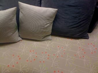 couch + ottoman + 3 big pillows - $150 3
