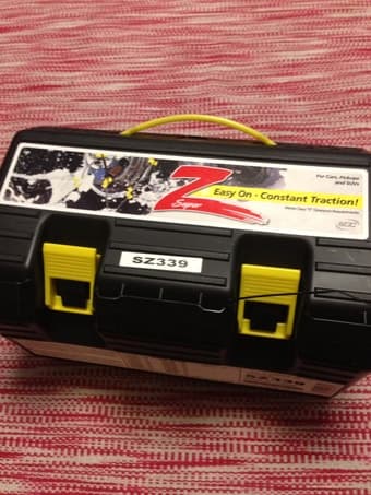 Snow chains-- never used or opened. $25, worth $60 1