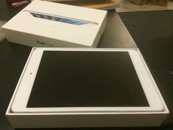 $400 NEW, in original box. iPad Mini 16GB white (wifi, AT&T) 2