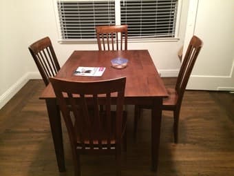 Dark wood dining table, seats six ($125 OBO) 1
