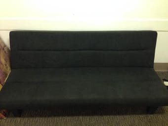 Selling 1-year old black futon for $150 (obo) 1