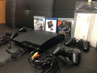 120GB PS3 Slim + 4 Controllers + 2 games - $200 1