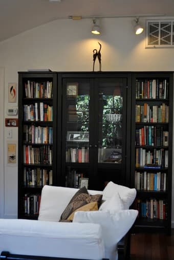 Beautiful, Elegant Ikea glass case/bookshelves $280. 1