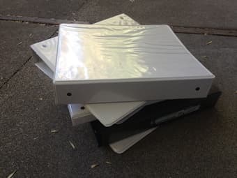 round-ring binder black & white $1 each 2