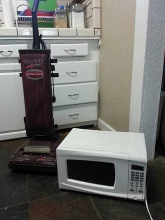 Vacuum Cleaner $15 and Microwave $25 1