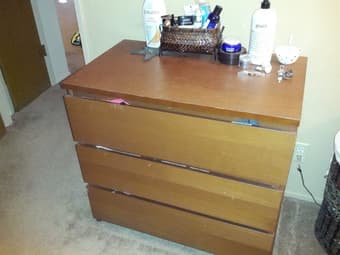 Dresser, shoe rack, DSL modem 1