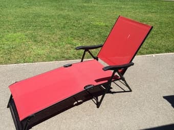 2x Red outdoor lounge chairs - great for patios or beach days 1